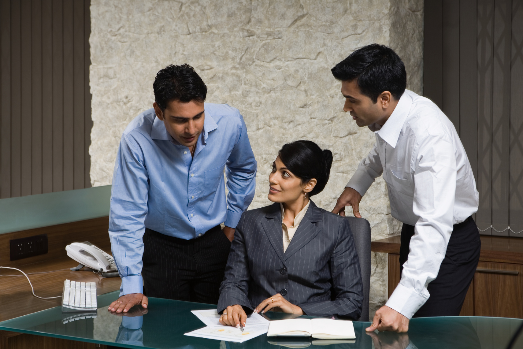 Three indian office colleagues